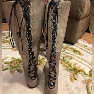 Funky tall taupe leather laced behind calf flat boot
